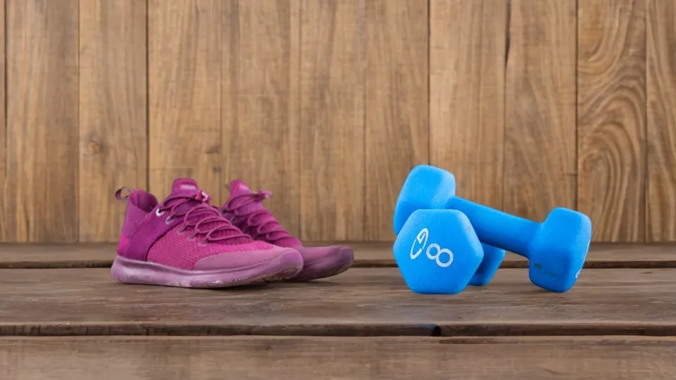 The sneakers and dumbbells in a generated wooden scene