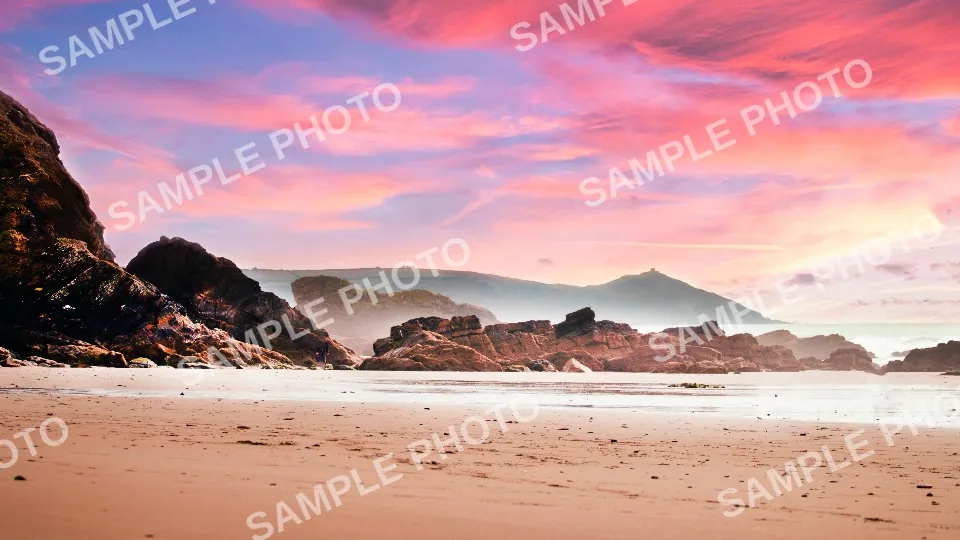 Beach at sunset covered with a repeated SAMPLE PHOTO watermark