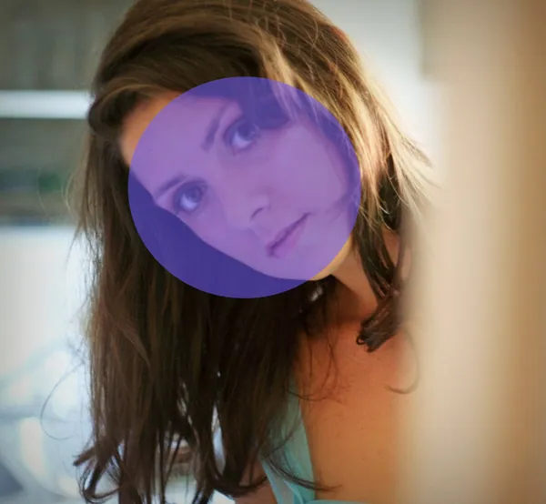 A photo with the area to retouch painted in purple